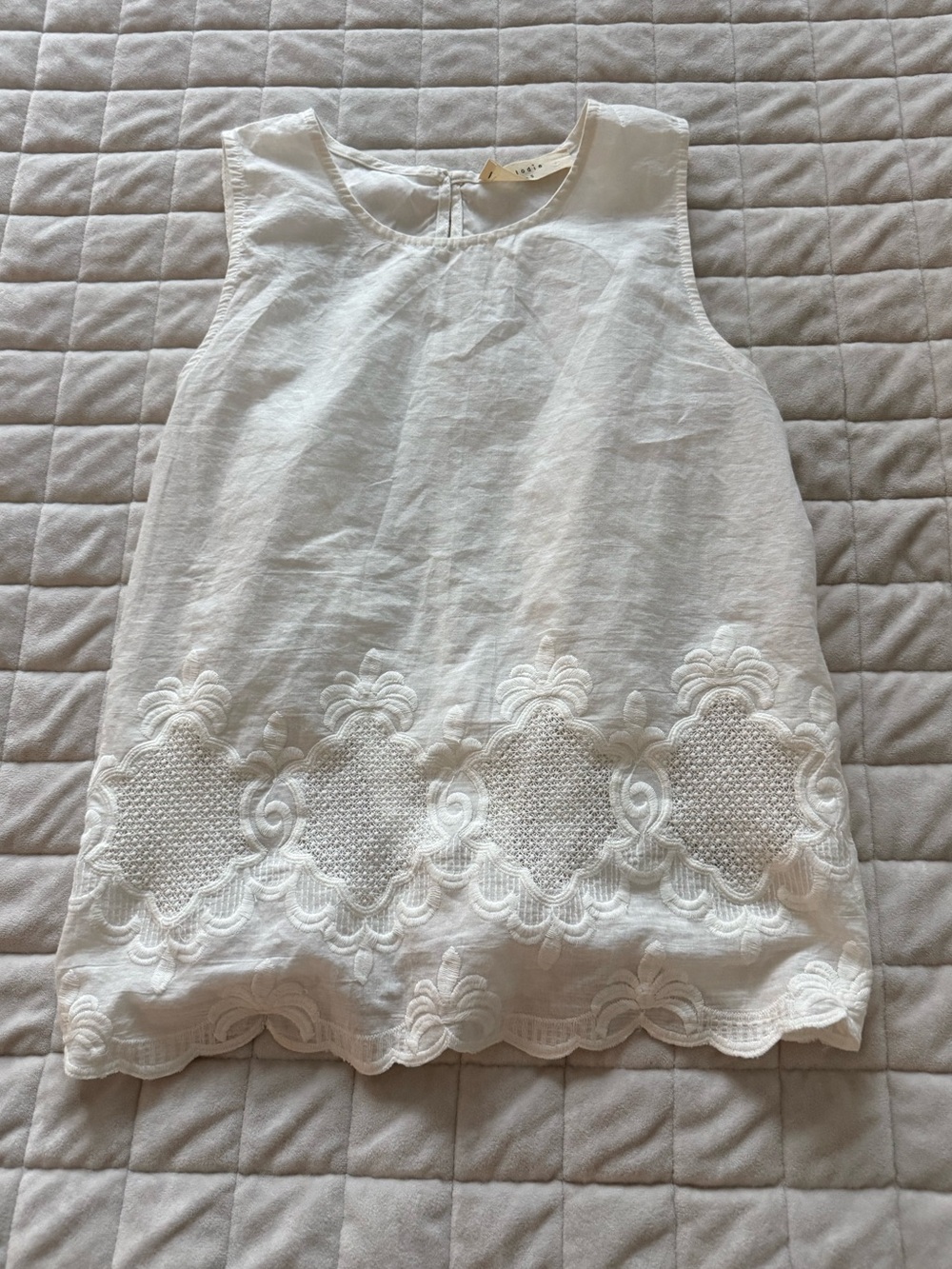 Elegant White Embroidered Sleeveless Tie Back Top